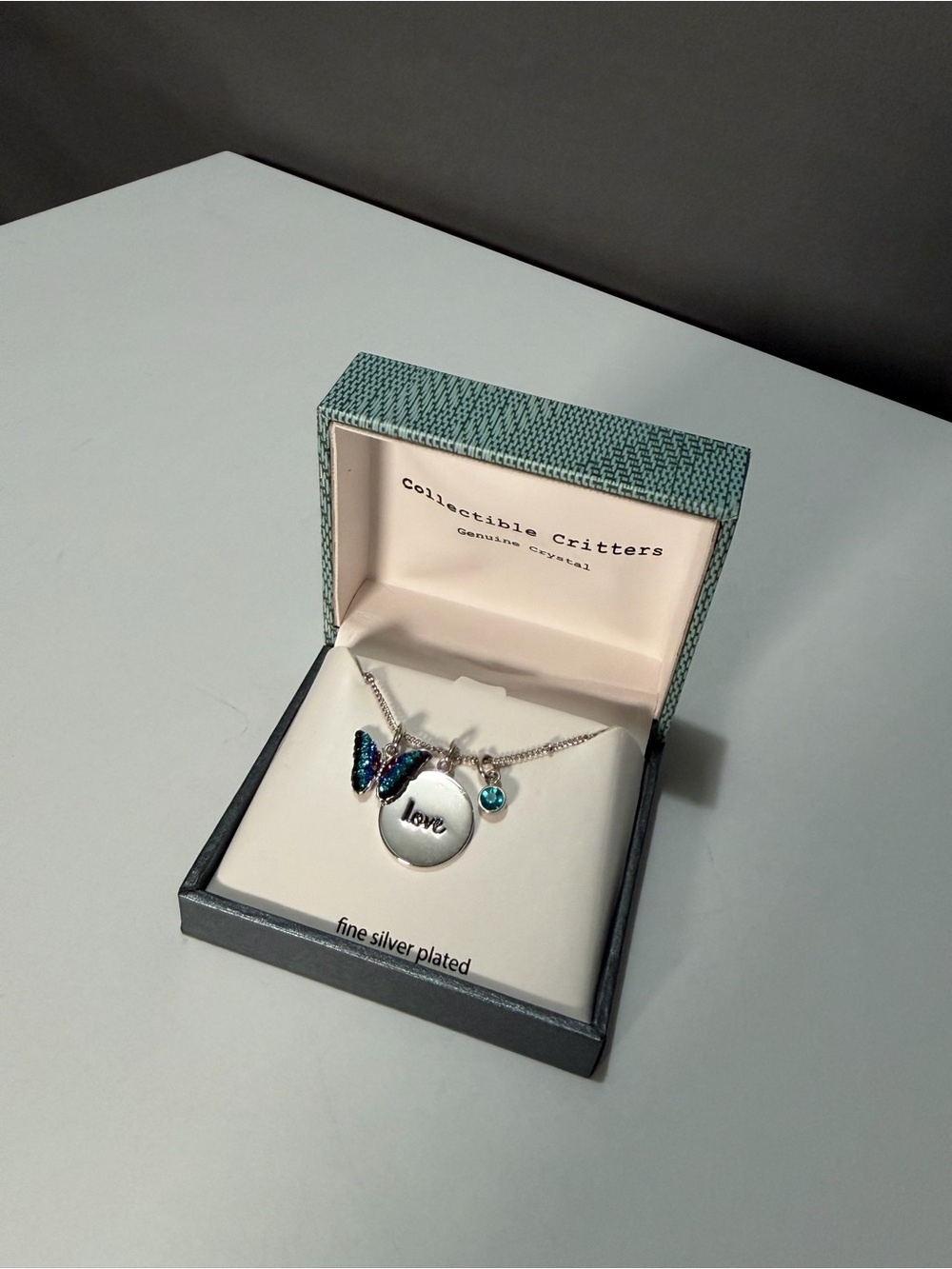 Silver-Plated 'Love' Pendant Necklace with Blue Butterfly